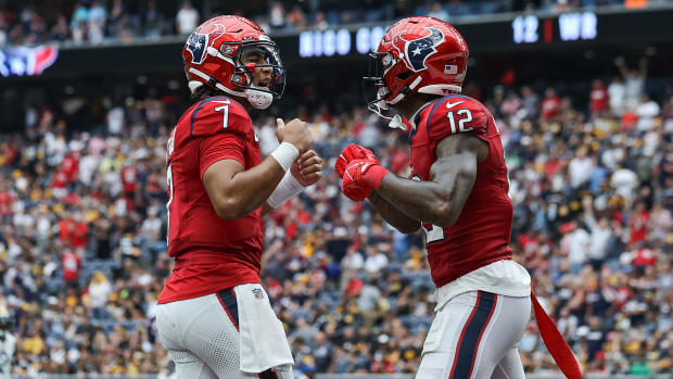 Houston Texans quarterback C.J. Stroud (7) and wide receiver Nico Collins (12) celebrate after a touchdown against the Pittsburgh Steelers at NRG Stadium Sunday. The Texans won 30-6.